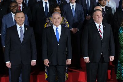 Polish President Andrzej Duda, left, Israeli Prime Minister Benjamin Netanyahu and U.S. Secretary of State Mike Pompeo in a group photo on the opening evening of the "Ministerial to Promote a Future of Peace and Security in the Middle East" on Feb. 13, 2019 in Warsaw, Poland.