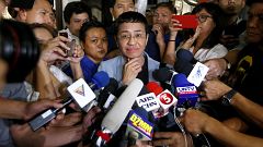 Image: Maria Ressa, center, the award-winning head of a Philippine online n