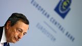 ECB's Draghi defends stimulus even as eurozone economy improves