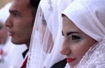 30 couples celebrate simultaneous wedding in Aleppo