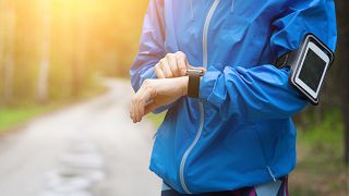 Watch for sports with smartwatch. Jogging training for marathon.