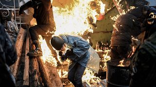 Image: Protesters during clashes with police in Kiev in 2014