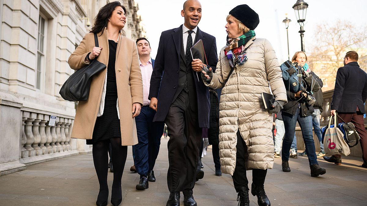 Image: Labour MP Chuka Umunna walks with Conservative MPs Heidi Allen, left