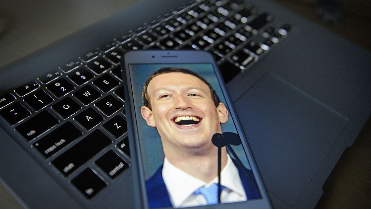 Facebook CEO photo illustration on portable devices