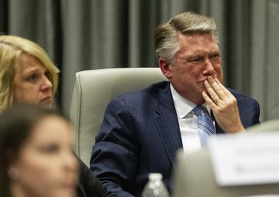 Mark Harris, Republican candidate in North Carolina\'s 9th Congressional race, fights back tears at the conclusion of his son John Harris\'s testimony during the third day of a public evidentiary hearing on the 9th Congressional District voting irregularities investigation Won Feb. 20, 2019.