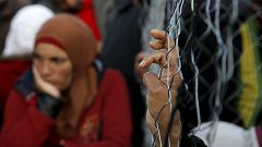 EU threat of legal action over slow relocation of refugees