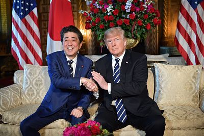 President Donald Trump greets Japanese Prime Minister Shinzo Abe at his Mar-a-Lago resort in Palm Beach, Florida, last year.