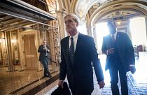 Image: Robert Mueller departs after a closed-door meeting