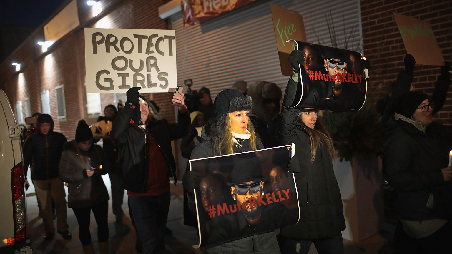 Protestors Rally In Support Of Sex Abuse Survivors At R Kelly's Chicago Stu