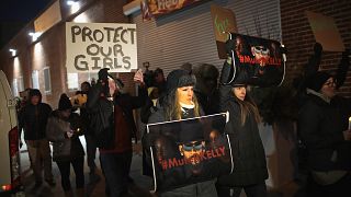 Protestors Rally In Support Of Sex Abuse Survivors At R Kelly's Chicago Stu