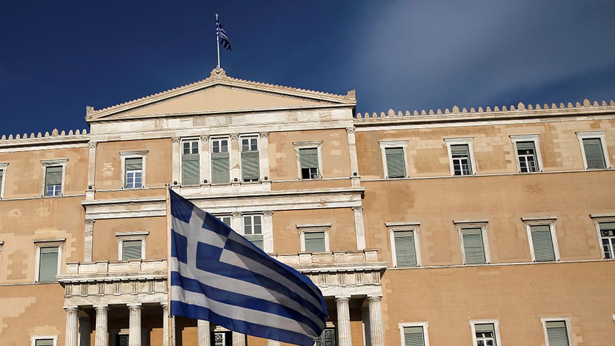 Greek parliament approves more pension cuts and tax hikes