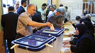 Iran voters face stark choice in presidential poll