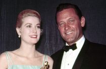 1954: Best Actress GRACE KELLY [The Country Girl] accepts Oscar from the pr
