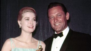 1954: Best Actress GRACE KELLY [The Country Girl] accepts Oscar from the pr