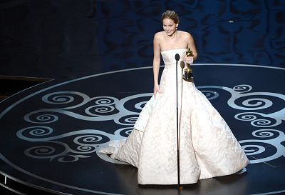 Jennifer Lawrence accepts the best actress award for "Silver Linings Playbook" in 2013.