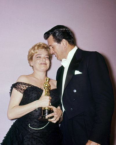 French actress Simone Signoret with the best actress Oscar she took home for her work in "Room at the Top."