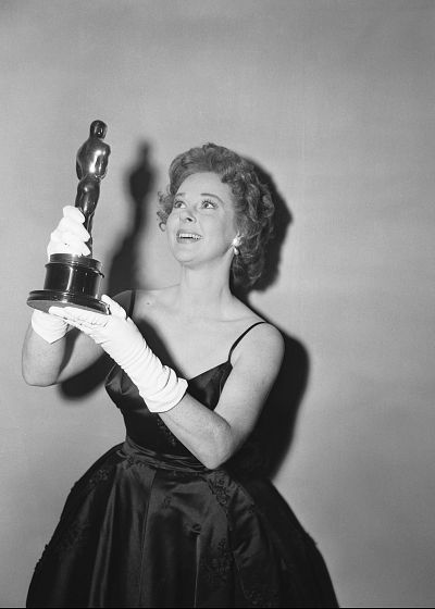 Susan Hayward poses happily with her Oscar after being named best actress.