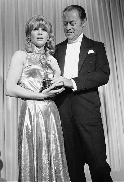 Julie Christie holds the Oscar she won as best actress for "Darling."