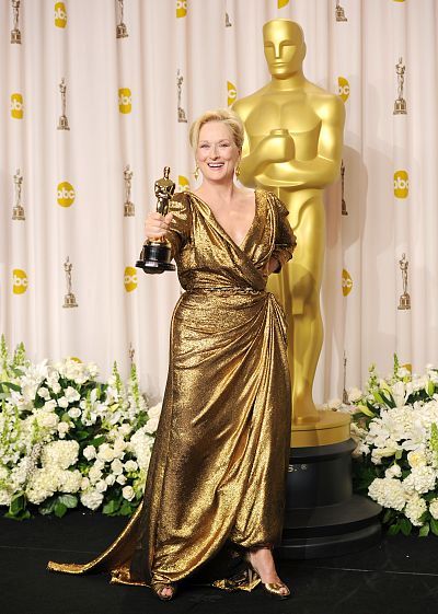 Meryl Streep holds her prize for best actress for "The Iron Lady."