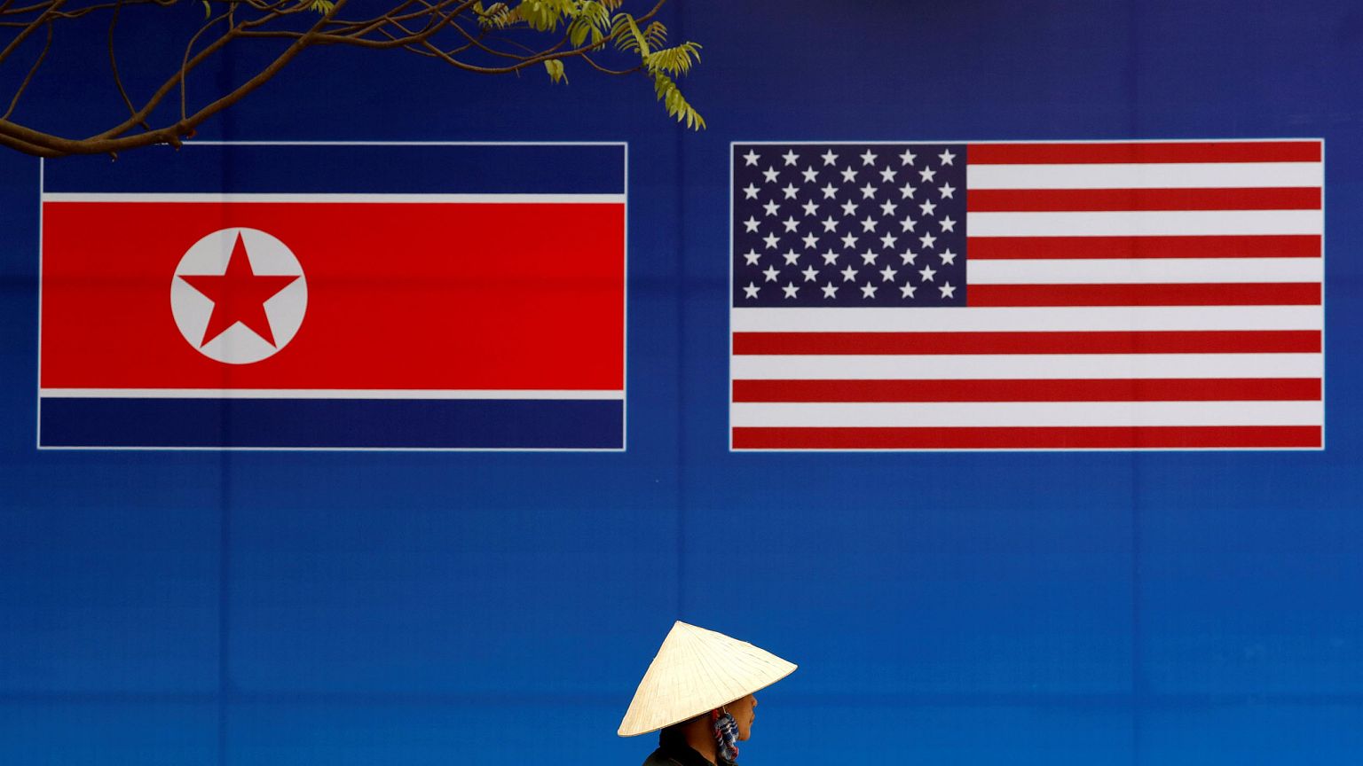 Image: A banner showing North Korean and U.S. flags ahead of the this weeks