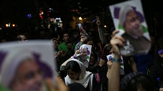 Iran: Rouhani supporters celebrate election victory into the night