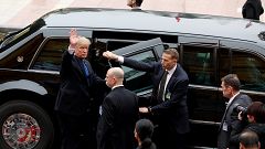 Image: President Donald Trump waves after a meeting in Hanoi, Vietnam, on F