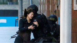 Sydney coroner says police acted too slowly in cafe siege