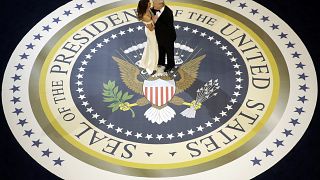 Image: President Donald Trump dances with first lady Melania Trump