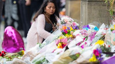 Manchester pays tribute to bomb attack victims