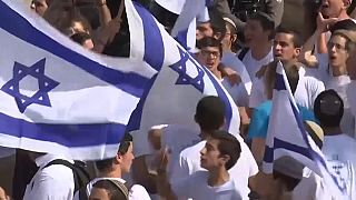 العفو الدولية تدين مسيرة الأعلام الإسرائيلية في القدس