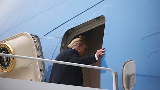 Image: President Donald Trump boards Air Force One after his summit with No