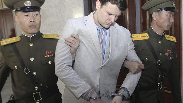 Image: Otto Warmbier is escorted at the Supreme Court in Pyongyang Image: Otto Warmbier is escorted at the Supreme Court in Pyongyang