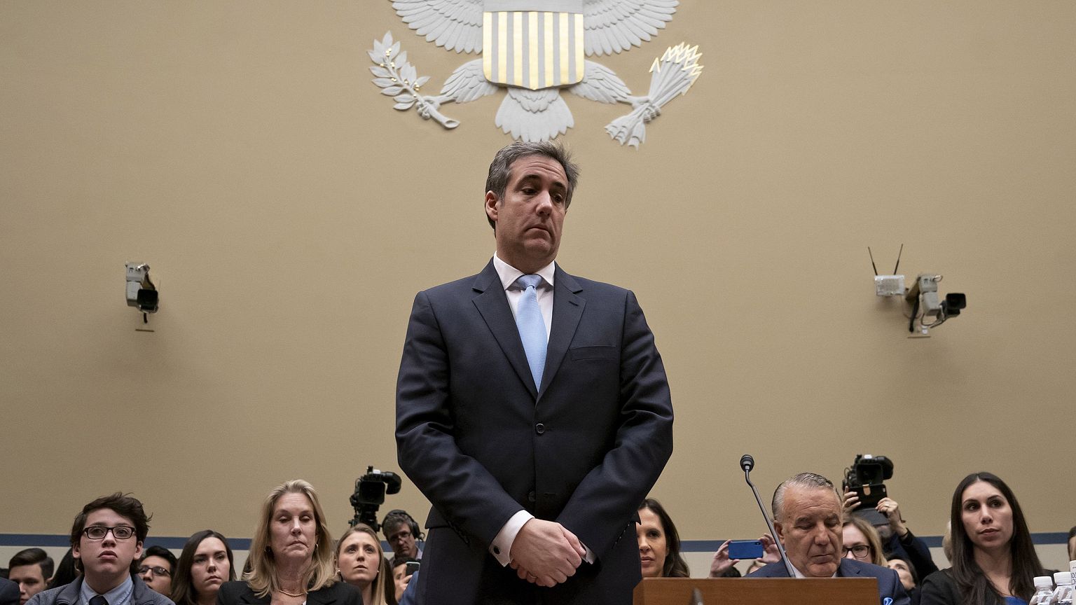 Image: Michael Cohen, President Donald Trump's former personal lawyer, paus