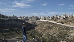 Image: Anti-settlement activist Shabtay Bendet surveys the highway critics 