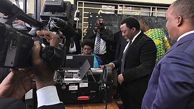 President Kabila registers to vote in DR Congo's uncertain election