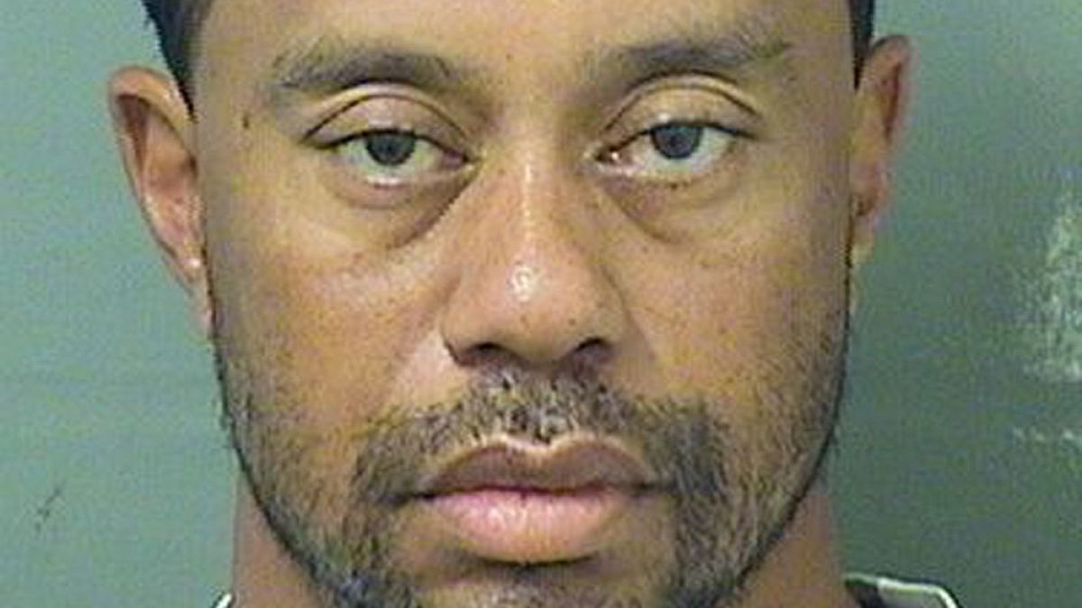 Former world number one golfer Tiger Woods arrested in Florida on drink-driving charges.