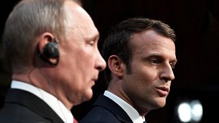 Vladimir Putin shows little appreciation of Emmanuel Macron's speech