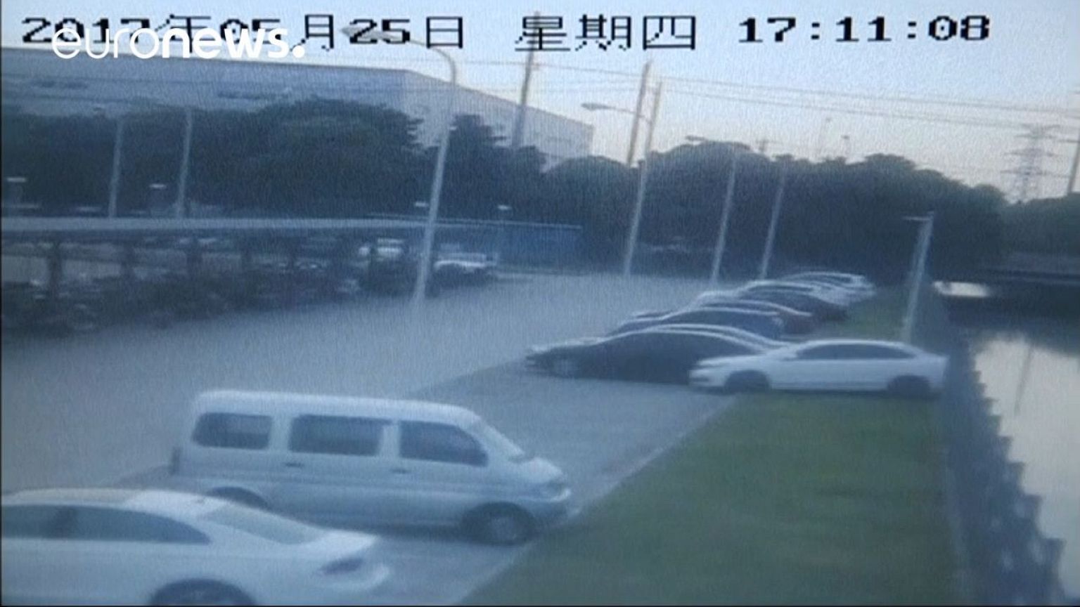 Mystery man rescues workers after car driven into river