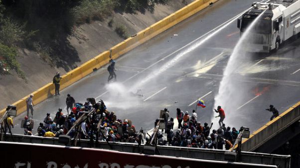 Venezuela'da hükümet karşıtı gösteriler sürüyor Venezuela'da hükümet karşıtı gösteriler sürüyor