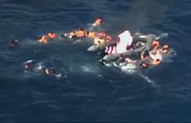 نجات مهاجران از قایق آتش‌ گرفته در دریای مدیترانه