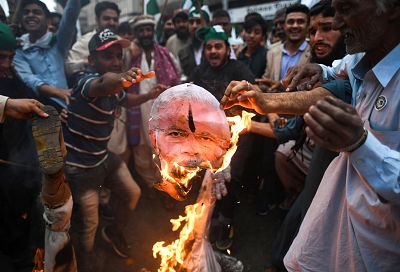 Activists of Pakistani Peoples Party (PPP) burn an effigy of Indian Prime Minister Narendra Modi during an anti-Indian protest in Karachi on March 1, 2019.