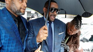 Image: Grammy-winning R&B star R. Kelly arrives for a child support hearing