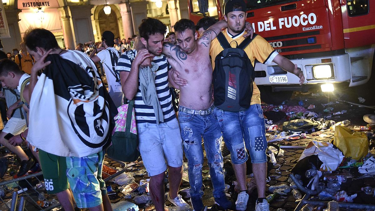 Hundreds of football fans hurt in Turin stampede