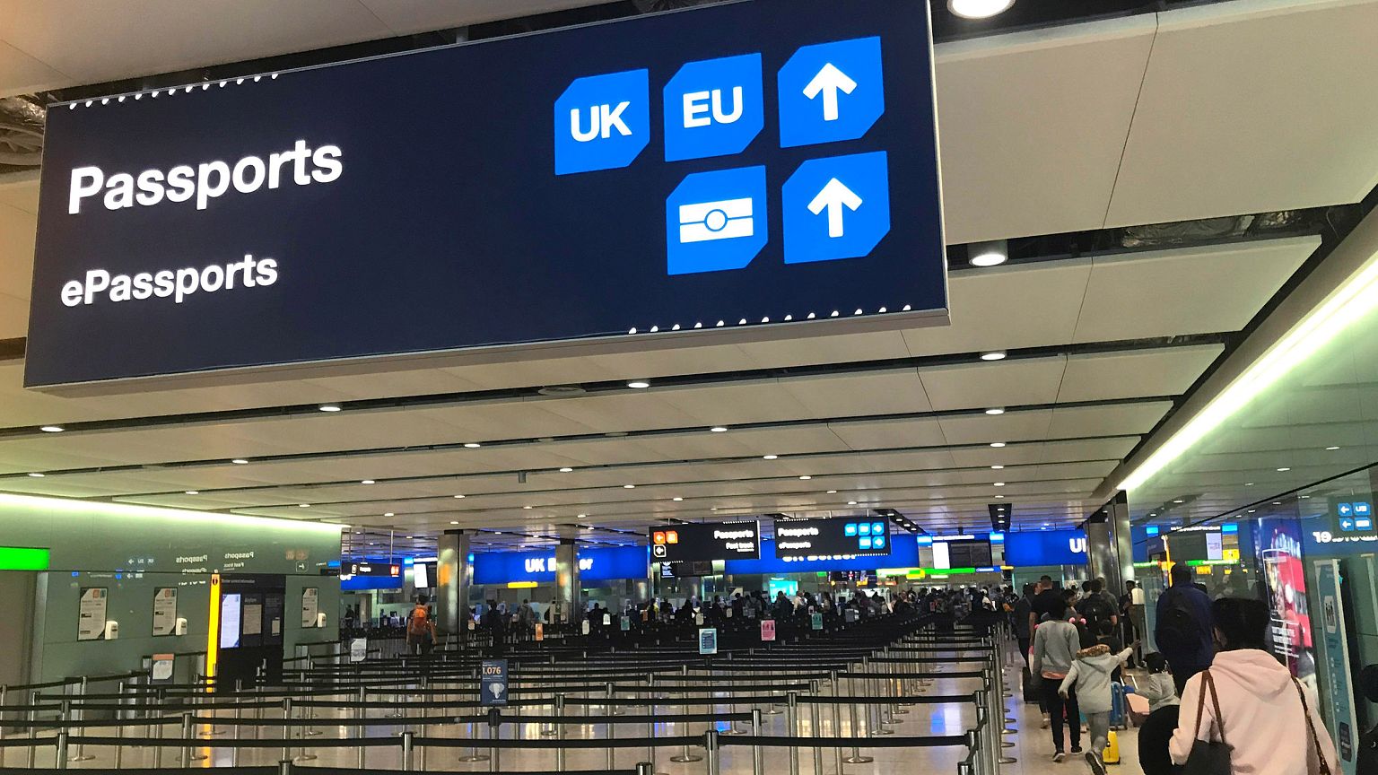 Image: Signage is seen at the UK border control point at the arrivals area 