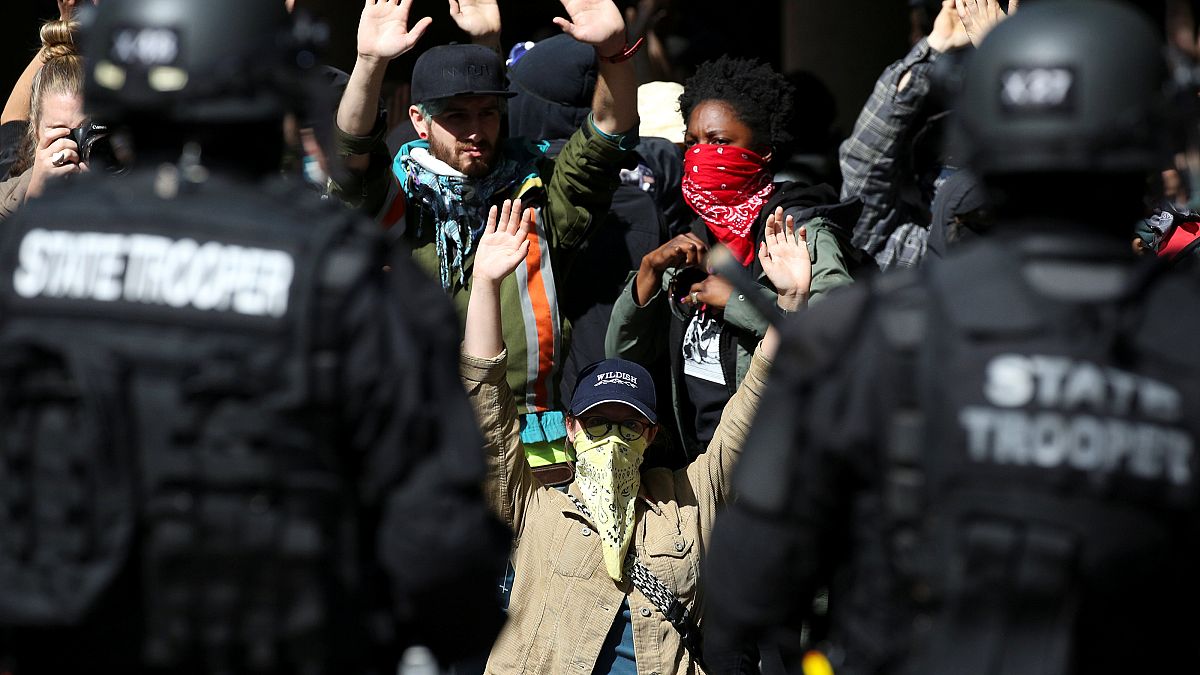 Arrests made as Portland protesters clash