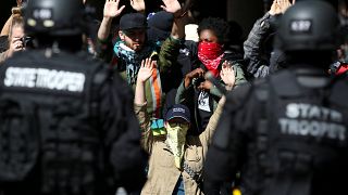 Arrests made as Portland protesters clash
