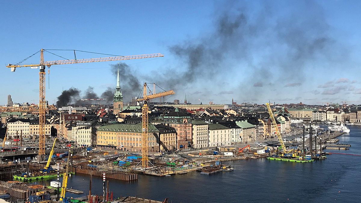 Image: Smoke rises over Stockholm after a bus exploded on March 10, 2019.
