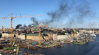 Image: Smoke rises over Stockholm after a bus exploded on March 10, 2019.