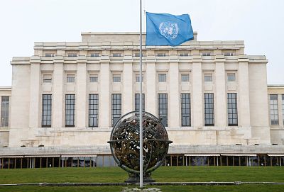 The U.N. flag flies at half-staff in Geneva, Switzerland, on Monday.