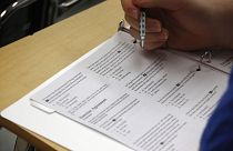 Image: A student takes a college preparation test at Holton Arms School in